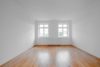 Moderne Familienwohnung mit Balkon in zentraler Lage - Bild